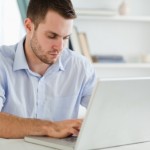 man using laptop