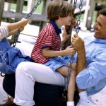 Man at park with his children