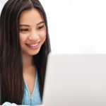 young woman writing resume