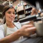 Woman making a cup of coffee
