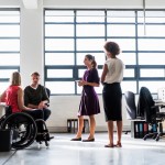 Workplace with employee in a wheelchair