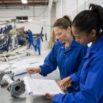 Women working on aircraft repair
