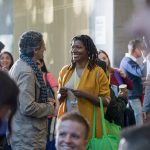 Professionals networking at an event