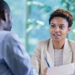 Career counselor advising client