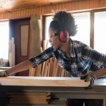 African american woman carpenter working