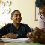 student at home on computer