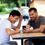 father and son talking