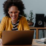 African American woman working on laptop