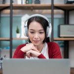 young businesswoman doing online training