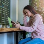 Worried young businesswoman