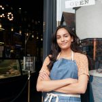 Shop owner outside her ice cream parlor